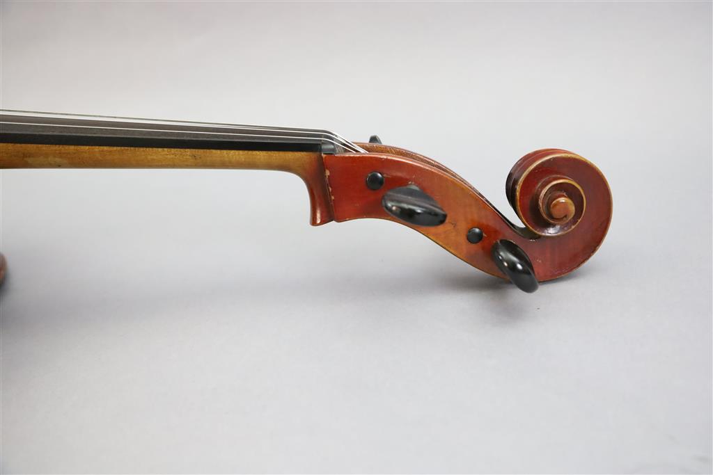 A late 19th/early 20th century German cello, labelled Schutz HD junior Marke, length of back 77cm